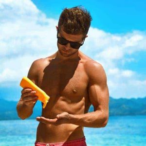 summer skincare man applying sunscreen protection royalty free image 637222044 1565275289