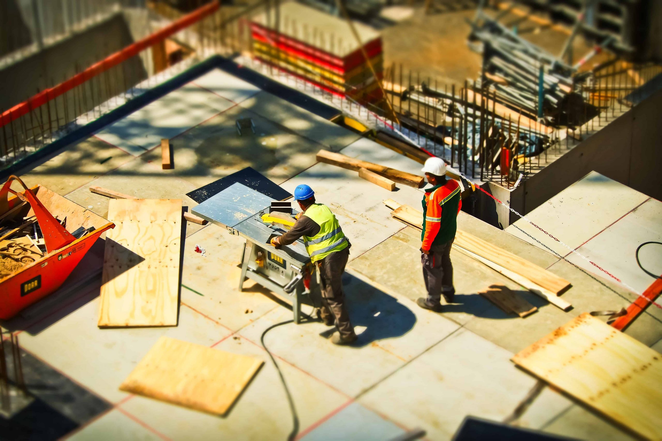 2 man on construction site during daytime stockpack pexels scaled